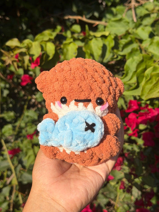 Otter Holding Fish Plushie
